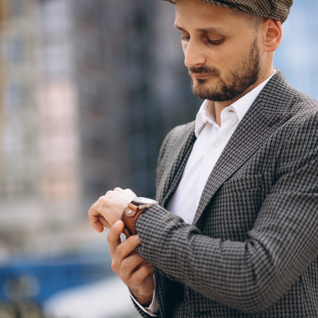 Successful business man by the skyscraper